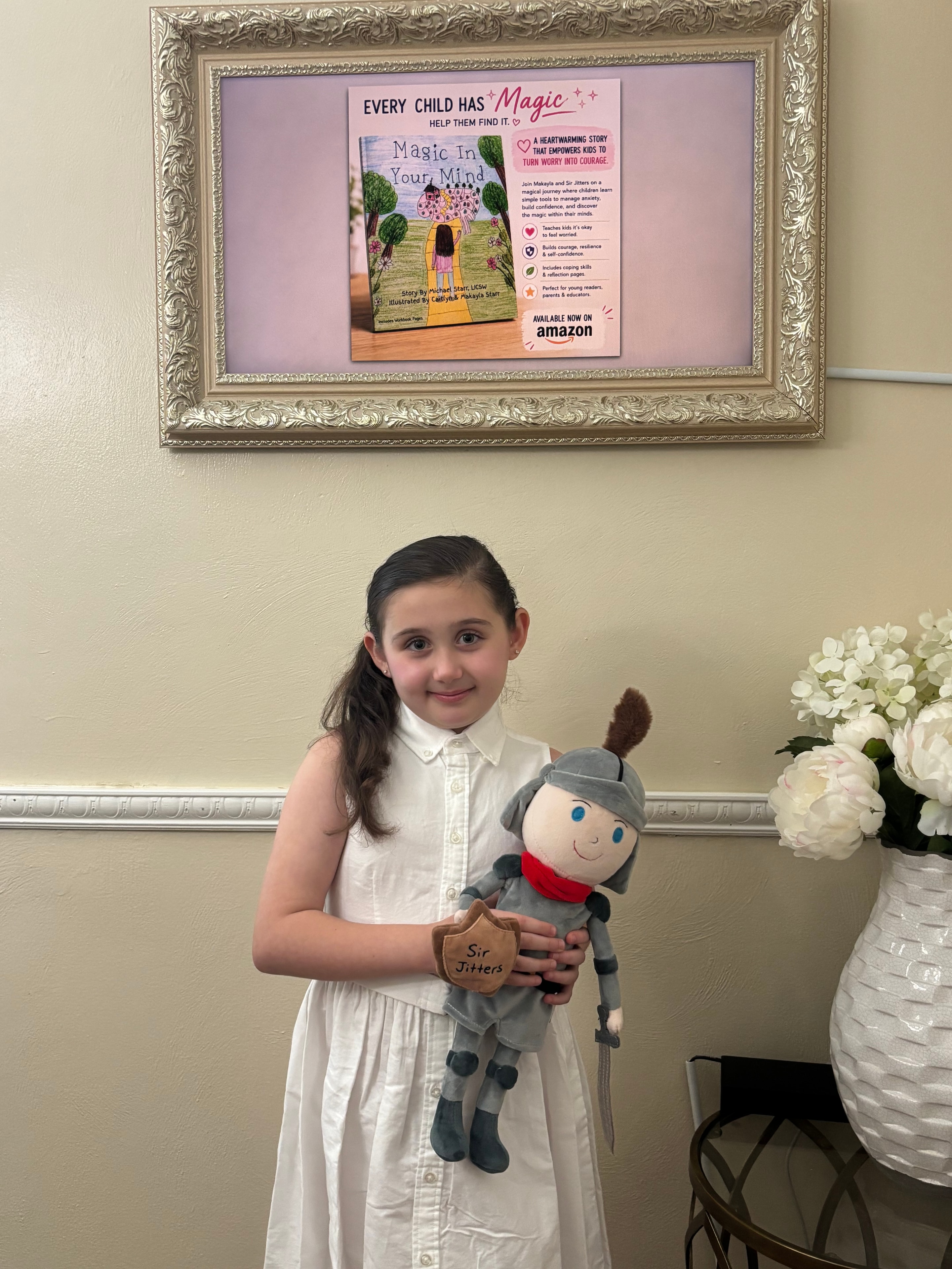 Makayla Starr holding Sir Jitters plush from Magic In Your Mind